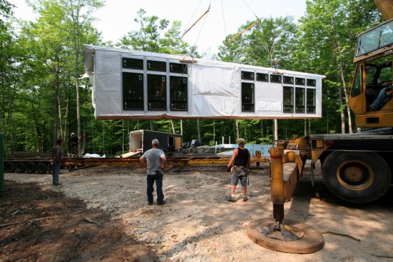 Prefab modules being set by crane