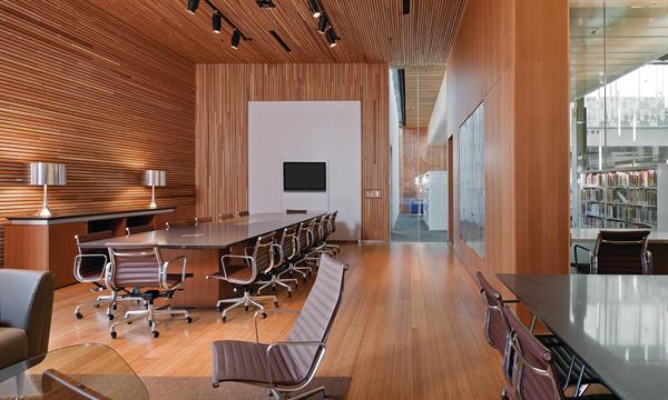 The warm wood confines of the archive room fill the south corner of the building?s second floor.