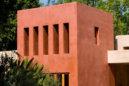 Mandeville Canyon modern home exterior with ribbon windows