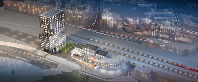 A rendering of the Esplanade Tower at night, overlooking the railway beyond.