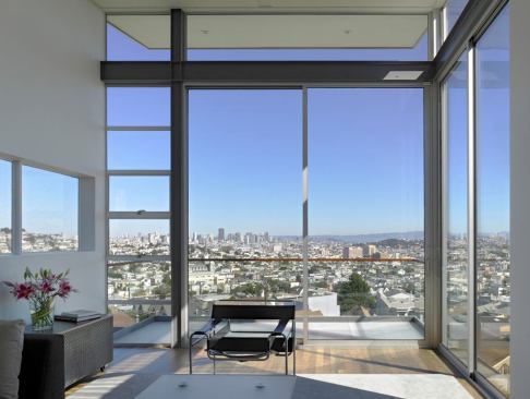 2009 CHDA Grand Award: Custom Home / 3,000 to 5,000 Square Feet Laidley Street Residence, San Francisco Entrant/Architect: Zack / de Vito Architecture, San Francisco; Builder: Built Form Construction, San Francisco Postcard views of San Francisco serve as the living room's main decoration.