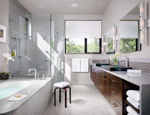 This new construction utilized materials and scale to blend a modern home into its Old Enfield neighborhood and received a 5-star Green Building Rating.