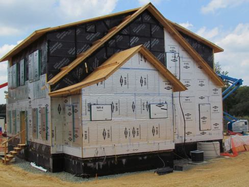 The home features two layers of 2-inch-thick insulation installed on the exterior.