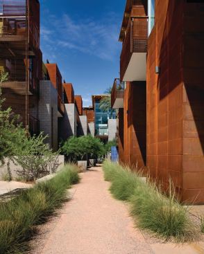 Teasing the barrier between residential and commercial space in an exclusive area, these condos reinvent the suburban form with walkable lofts fitted with retail on the ground floor. The live-work units are clad in Corten steel, and they sport industrial details such as exposed stairways and gridwork balconies. Project: Safari Drive Condos, Scottsdale, Ariz.; Builder: Okland Construction, Tempe, Ariz.; Architect: Miller Hull Partnership, Seattle