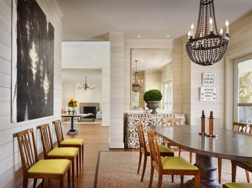 The formal dining room is partially enclosed for more intimacy.