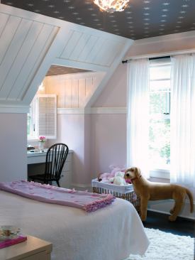 Larson tucked one of the home's four bedrooms under the eaves on the second level.