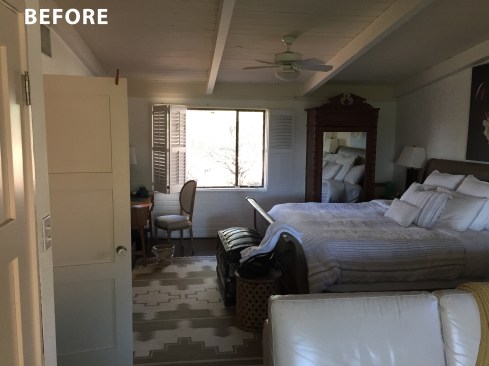 The former master bedroom, characterized by low ceilings, exuded a dark and cramped ambiance. The room featured only one window, further contributing to its limited natural light.