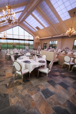 A system of color-changing LEDs above the ceiling throws a color wash onto the translucent Ceilume ceiling panels. The luminous ceiling can match the blue sky, the sunset, or the bridesmaids’ gowns. 