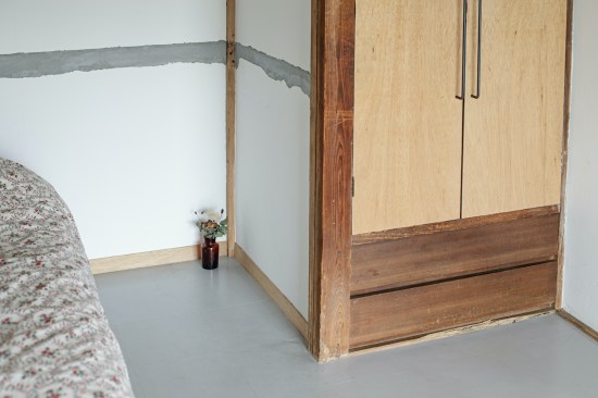 The previous in-wall closet on the 1st floor now accommodates the bed structure