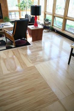 Sometimes a limited budget precludes wood flooring, but one creative option is plywood. Used often by architects on a budget, hardwood plywood (with a few coats of polyurethane) is a good (and cheap) solution for moderate traffic areas. It may not work for very busy rooms. This one in Italy is made from marine-grade plywood.