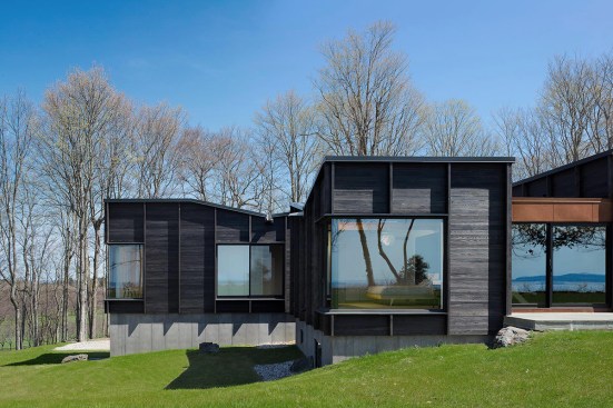 The master suite, seen here from the northwest, faces the lake.
