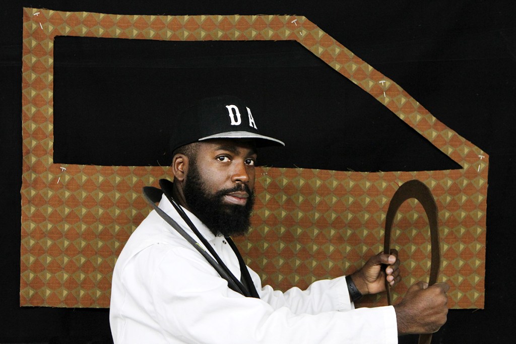 Artist Derrick Adams, photographed in his studio