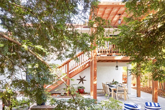 Mature redwood trees surround the Soria’s backyard, buffering traffic noise and blocking views into the neighbor’s backyard. The new deck and undercover dining area further enhance the backyard with more usable – and attractive – spaces.