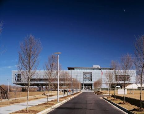The main approach to the Clinton Presidential Center cuts through a 30-acre city park beside the river.
