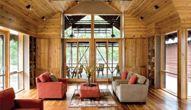 Operable windows and high ceilings encourage natural ventilation in the main living area.