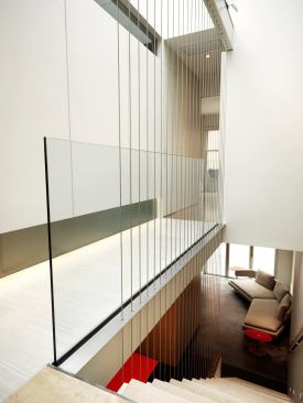 The use of glass walls, an open floor plan, and steel cables assure that this home will always have an abundance of natural light pouring in from above.   2011 Remodeling Design Awards (September)  Whole-House Remodeling $250,000 – $500,000  Kube Architecture, Washington, D.C.