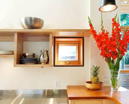 Built-in shelves and nooks maximize storage options.