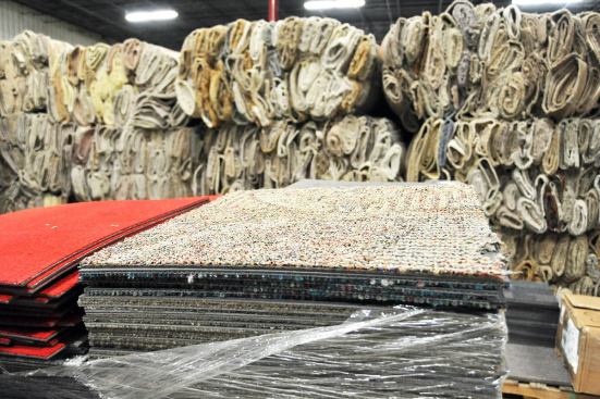 At ReEntry 2.0, Interface turns post-consumer carpet—broadloom and modular tiles—into reusable raw material. ReEntry receives thousands of pounds of carpet daily and nearly a million carpet tiles monthly. Since 1994, Interface has reclaimed more than 250 million pounds of carpet from landfills.