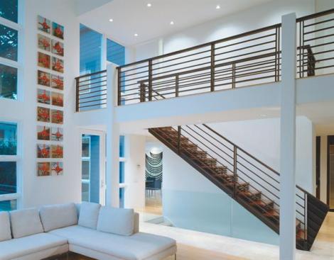 The upstairs balcony bridges the master bedroom and the children's bedrooms.