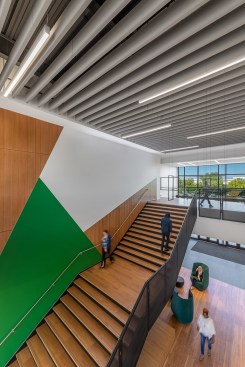 The monumental stair encourages team-based interaction across three floors.