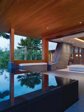 The infinity-edge pool is an extension of the living room.