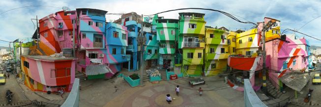 Artists Jeroen Koolhaas and Dre Urhahn (Haas&Haan) enlisted locals to help create nearly 23,000 square feet of colorful artwork on the exterior of 34 houses in the Rio de Janeiro hillside slum of Praca Cant&atilde;o.