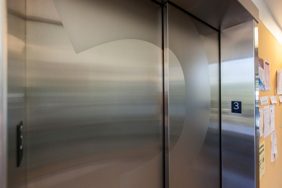 Stainless Steel Elevator Doors in Satin finish with custom Eco-Etch pattern at Clackamas Community College - Harmony Campus, Milwaukie, Oregon