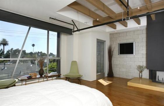 The steel-clad sleeping boxes on the third floor offer privacy, as well as views to downtown Venice and the Pacific Ocean.