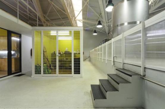 The kitchen, at far left, and a supply closet, are in the lower level of the facility.