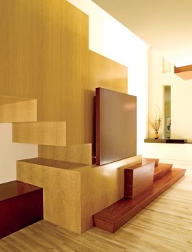CUSTOM HOME  January-February 2010  Last Detail  Under Appreciation    Architect Cathi House relied on rugged, exquisitely detailed woods to bring her staircase design to life. The dark red of Santos mahogany graces the steps and cutout accents. The staircase's underside is fashioned primarily from golden anigre.