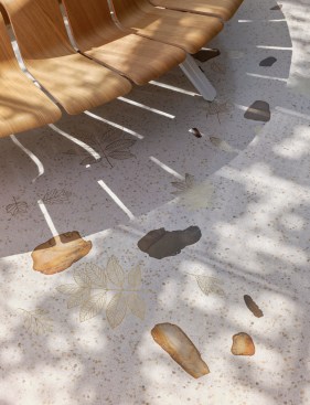 Lobby flooring at the Jack C. Taylor Visitor Center includes hand-lain terrazzo with local river rocks.