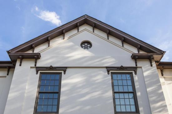 Language Hall windows were replaced with replicas of the originals, using aluminum-clad wood painted a dark neutral color.