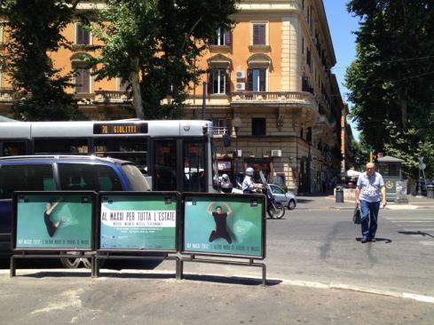 Throughout Rome, sidewalk advertising is promotign the installation, which will be on view until September 23.