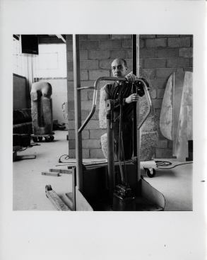 Noguchi in Long Island City studio with works, 1966