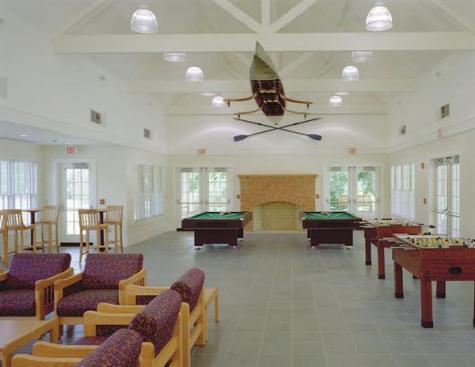 By facing the dormitory buildings onto a central lawn, Muse Architects bestowed a small-town feeling on the project. Residents enjoy various levels of public space, including generously sized loggias and a communal lounge.