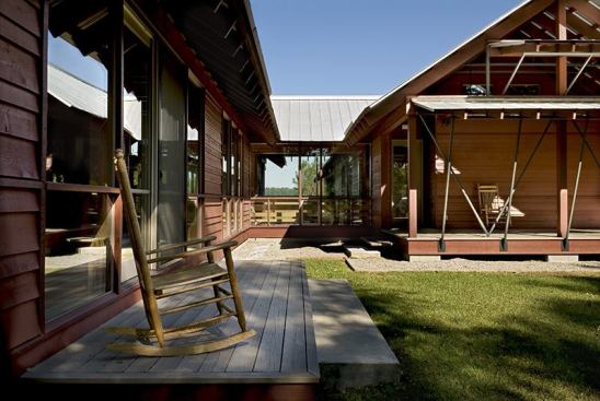 Glass-walled walkways connect the pavilions. Delicate-looking steel supports for the roofs supply structural strength without adding bulk.