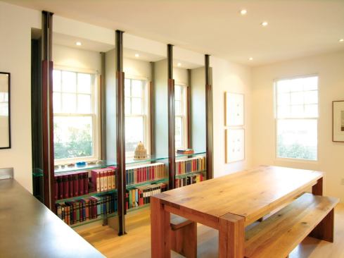 The glass shelves are repeated throughout the house.