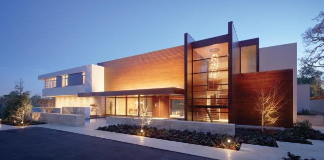 A limestone base, meticulously laid out and built, ties together the home's exterior elements.