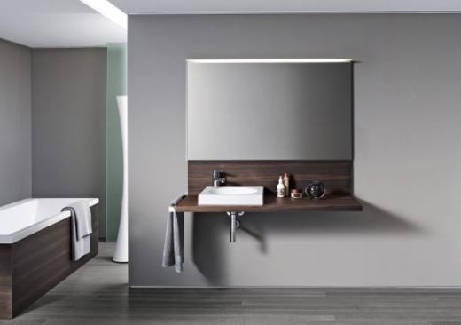 Duravit and EOOS designed the Delos bath vanities with invisible fittings, a mirror with reflective sides, and non-glare LED lighting to evoke weightlessness, the company says. The vanities come in dark-walnut or light-oak wood finishes as well as a high-gloss white. Duravit, 770.931.3575; www.duravit.com.