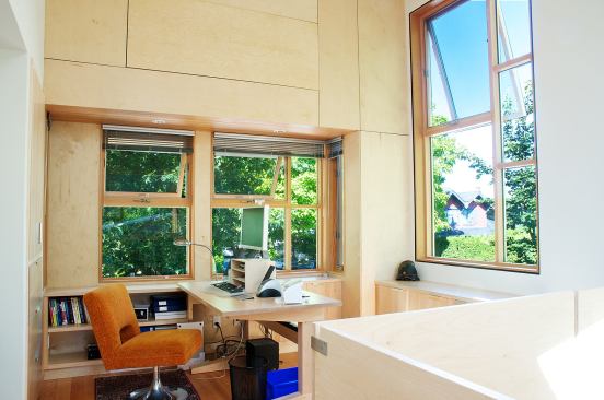 The clients wanted a home office that was tucked away from public spaces but open.