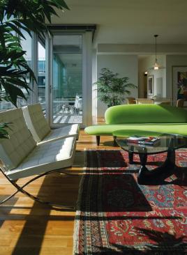 Each unit has floorto- ceiling windows. Many units have small terraces (set within the building volume), and many rooms have operable floor-level window panels that permit natural airflow.