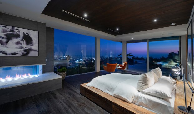 Modern Hollywood Hills home family room with luxury fireplace.