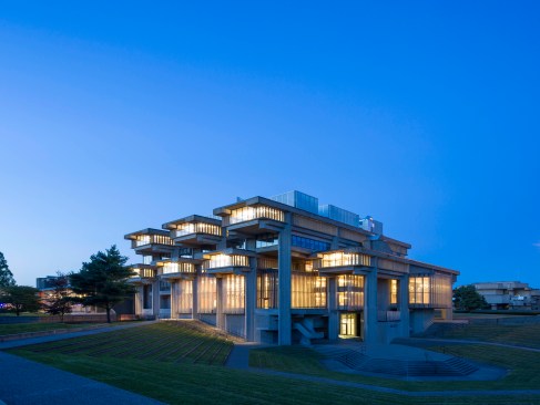 warm lighting and new glazing reveal the renewed concrete building, with inviting views into the south reading room, grand reading room and upper levels.