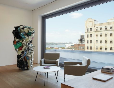 The director's office features a picture window with views out to the river.