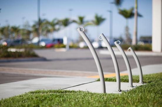 Bike Garden Bike Racks shown in surface mount configuration with Aluminum Texture powdercoat at Page Field, Fort Meyers, Florida