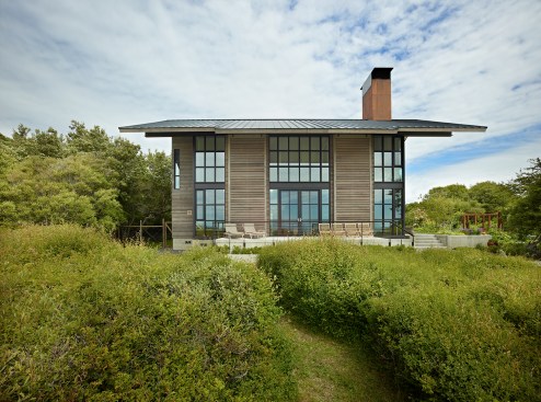 Beach+facade+with+exterior+shutters+shown+in+open+position.