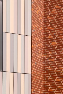 Research and development are integral to our design process, and working with materials and fabrication methods for a unique solution is part of this process. The architectonic character of the façade is central to the building’s presence, and in this case we worked with clay that is fabricated with 2 different methods: locally sourced traditional hand-laid hollow brick and modern pre-fabricated extruded rain screen cladding. UO Tykeson Hall, OFFICE 52 Architecture, Design Architect.
