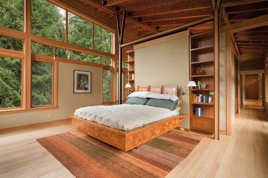 Many of the house's furnishings were fabricated for this project, including a custom bed clad in cherry "shingles."