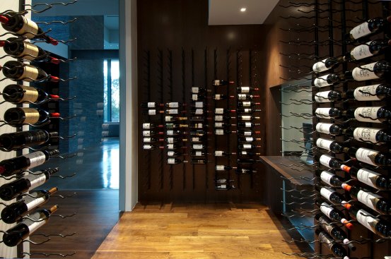 Beverly Hills modern home wine room storage.