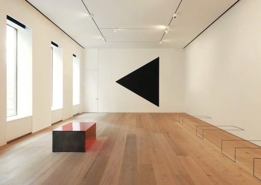 A second-floor gallery benefits from deep street-facing windows.